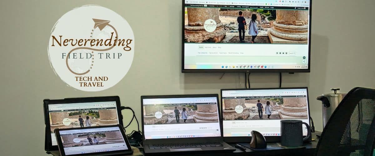 A Computer with multiple kinds of screens connected to it.
