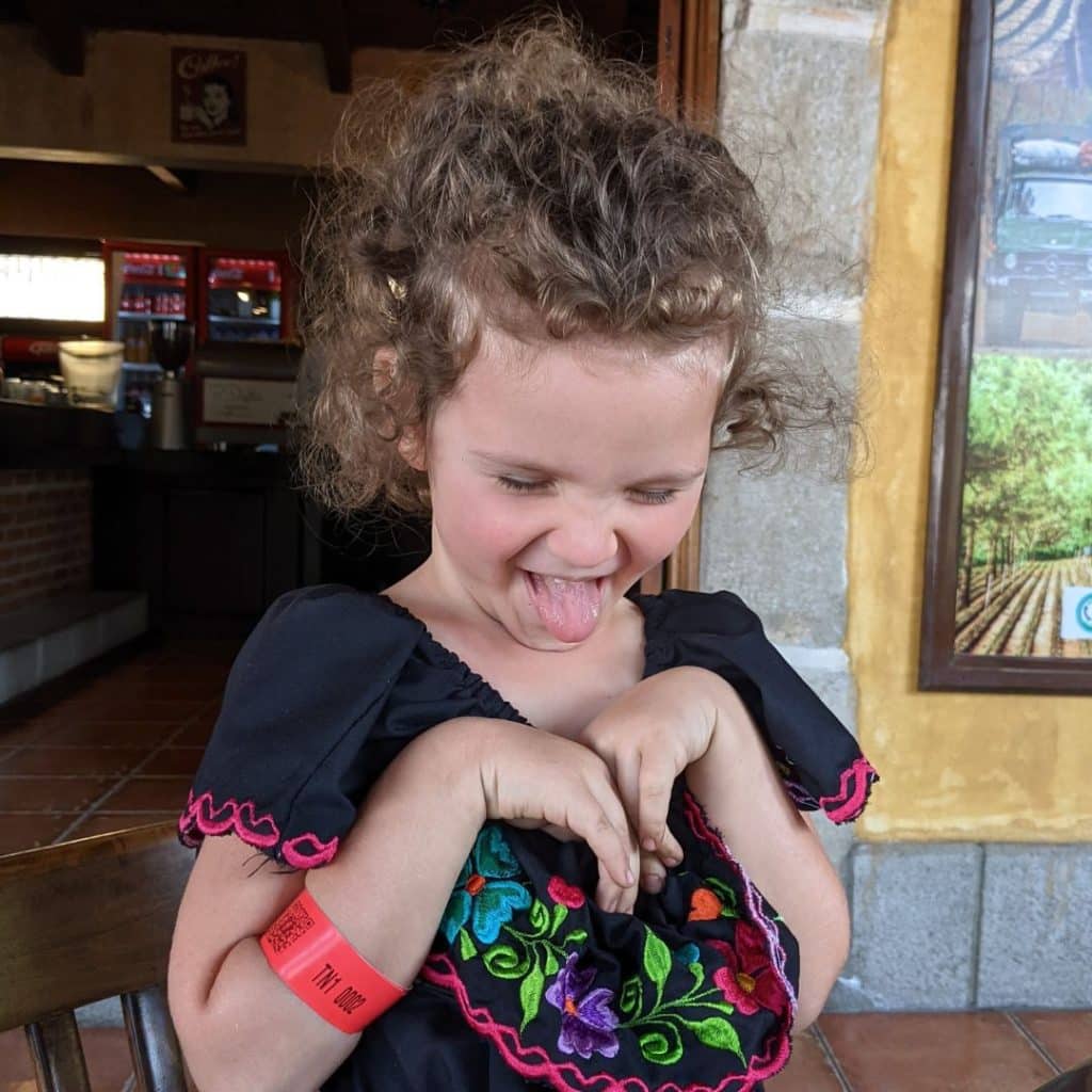 My daughter expressing her dislike of black coffee by sticking out her tongue.