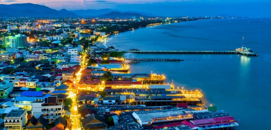 An aerial view of Hua Hin's coast lit up for the evening.