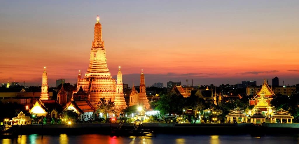 Wat Arun at sunset. The Temple has its lights turned on.