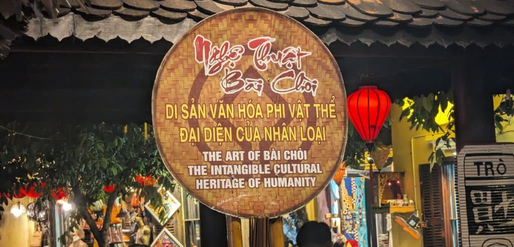 A sign at the Bai Choi huts saying that Bai Choi is intangible cultural heritage of humanity.