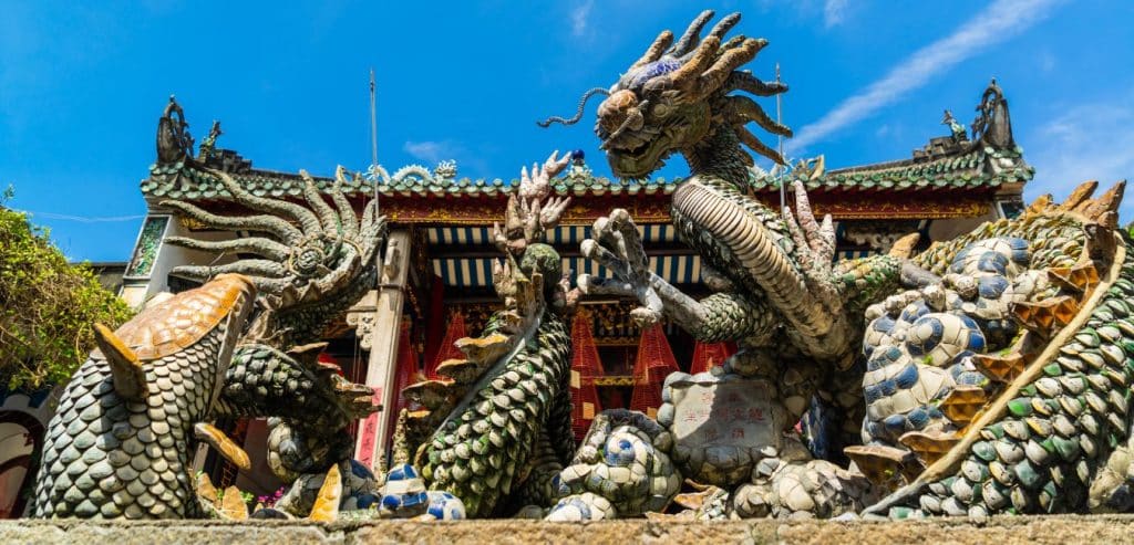 A dragon and carp statue in the Cantonese Assembly Hall in Hoi An.