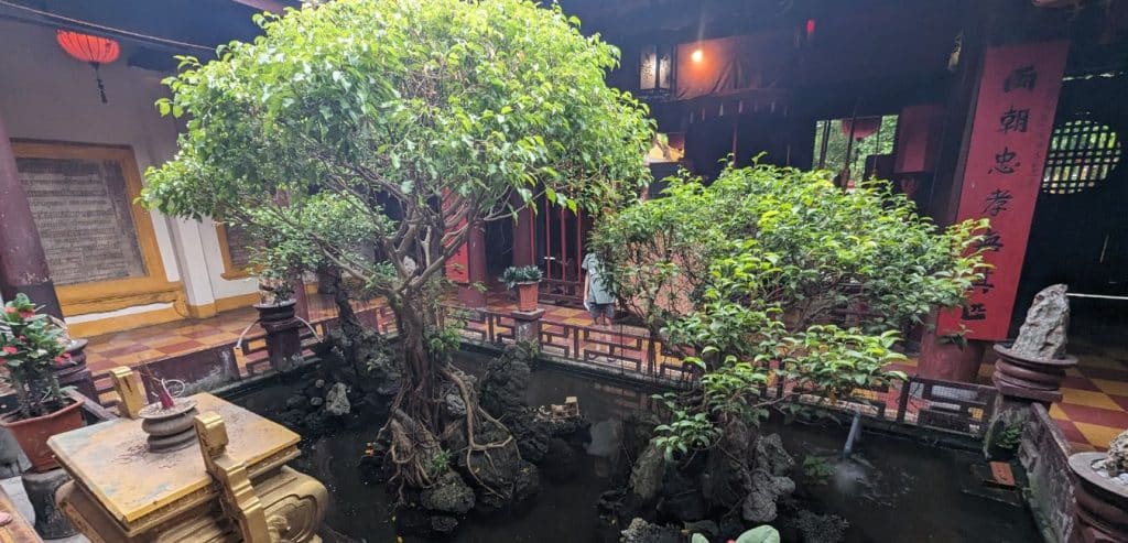 The koi pond and some small trees in the Quan Cong Temple in Hoi An.