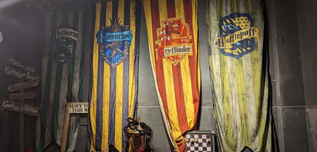 Harry Potter house banners on a wall at Always Cafe in Hanoi.