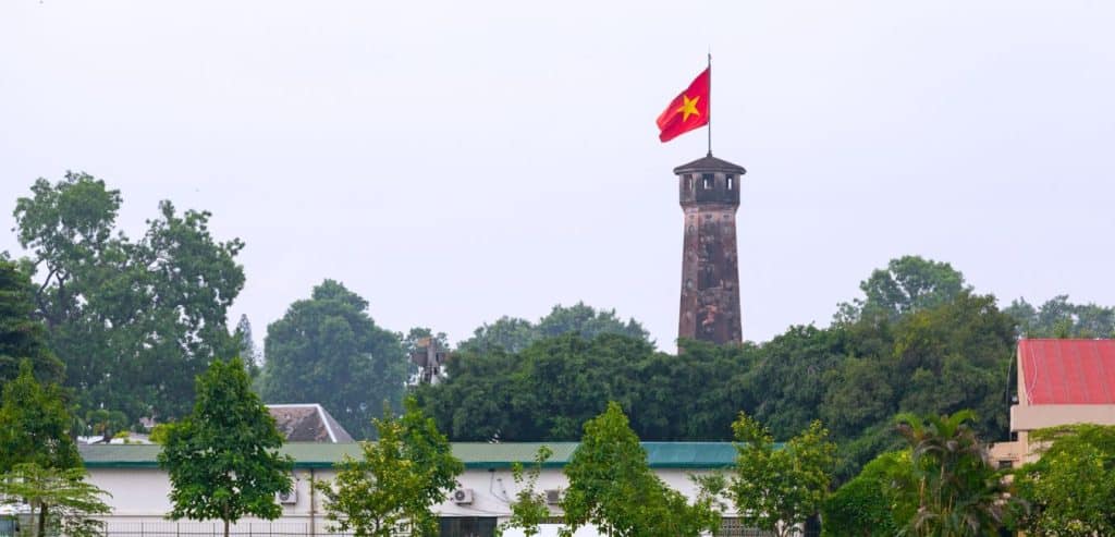 The Hanoi Flag tower is a cylindrical tower with the National flag on top.