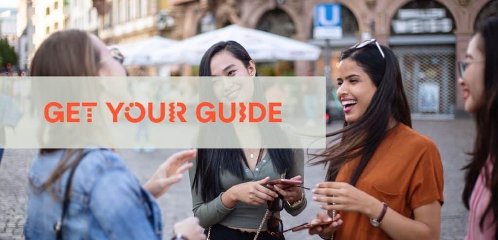 Get Your Guide Logo over a tour group