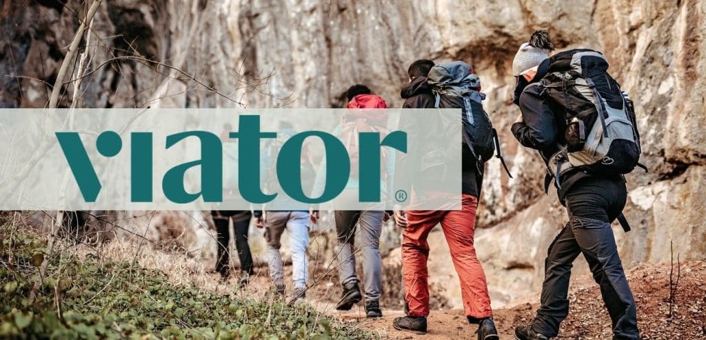 Viator Logo over a picture of a tour ship