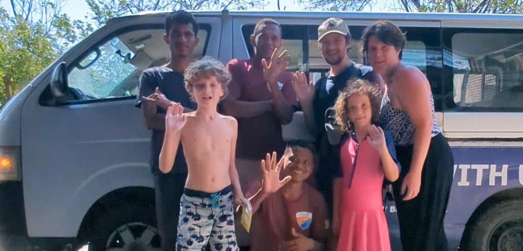 My family standing with the guides from our dive trip.