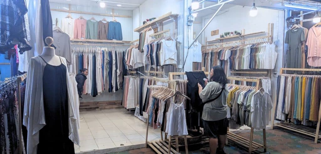 A street market stall selling clothes in Thailand