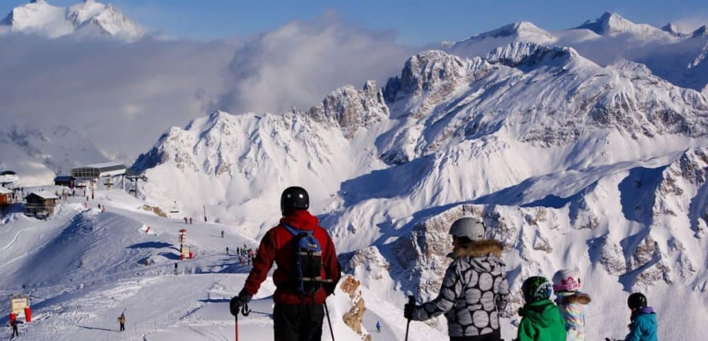 Skiers on on a snowy mountain in Italy